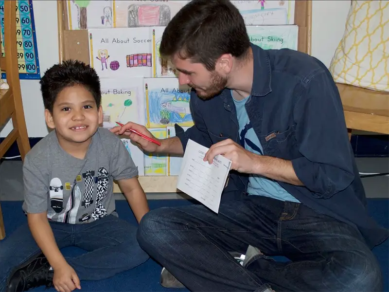 Mike teaching young student
